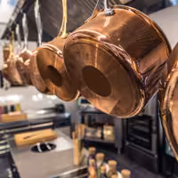 Wokpanna i aluminium - Ø 24 cm - kopparbeläggning utvändigt